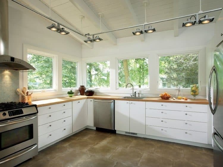 Kitchen with a continuous run of new windows above the counters